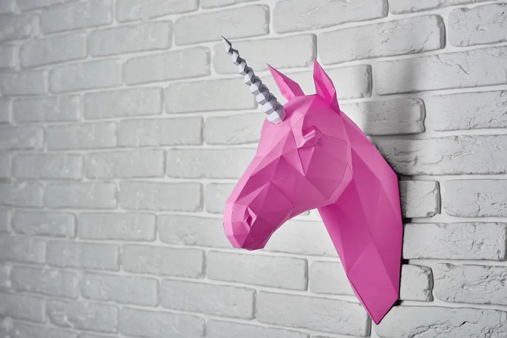 bright-pink-unicorn-hanging-on-the-wall-JLRRSNC-RZSD.png